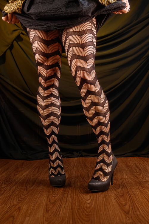 Slinking through the web net tights in black