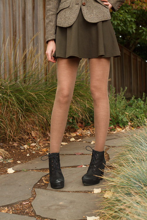 A person wearing Jennifer Wool Tights in Hazelnut