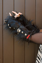 A person wearing Furtastic arm warmers
