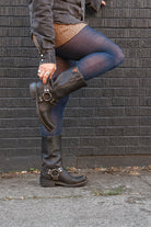 A person wearing Jennifer Wool Tights in sapphire