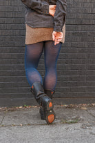 A person wearing Jennifer Wool Tights in sapphire