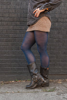 A person wearing Jennifer Wool Tights in sapphire